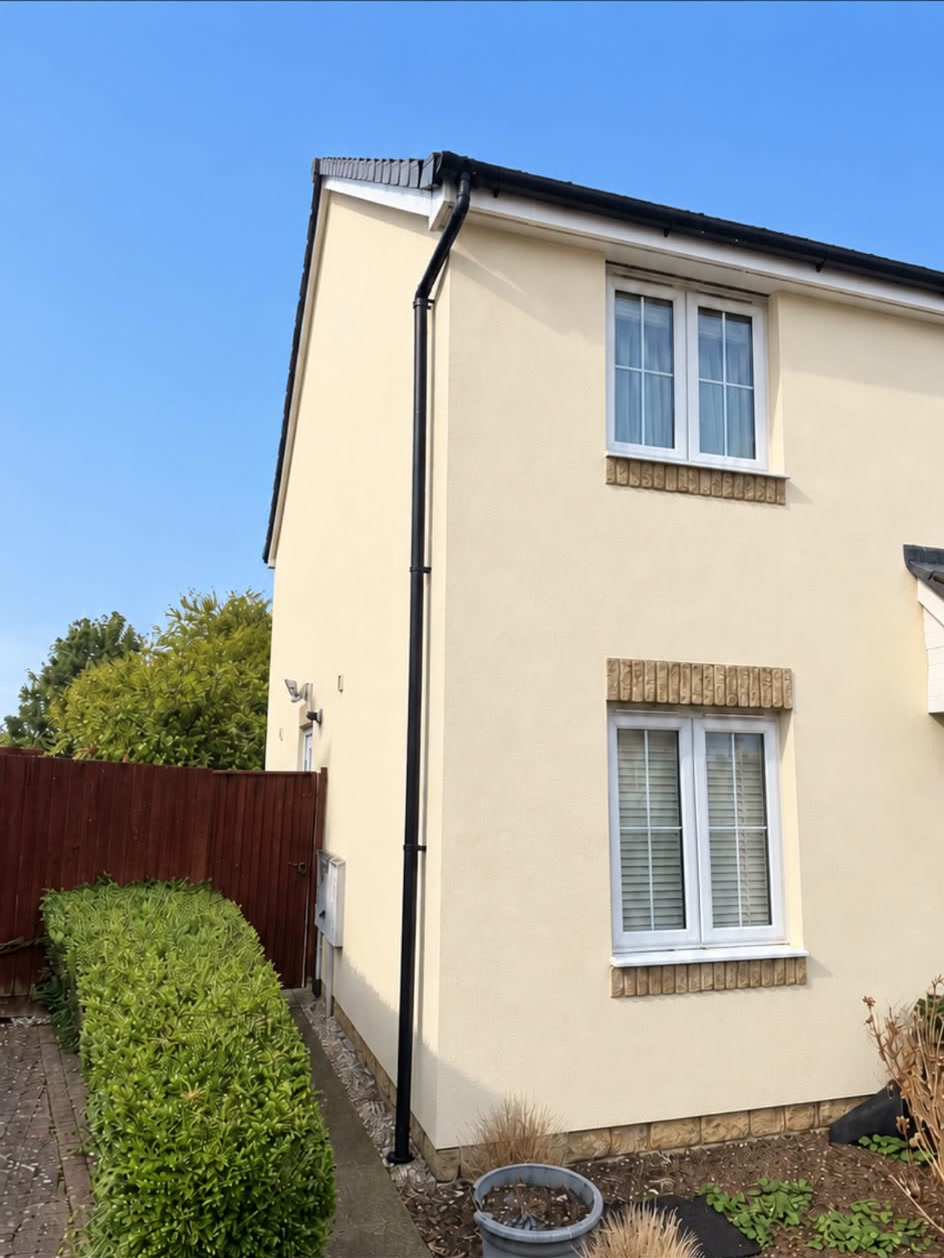 Exterior wall after professional preparation and spray finishing