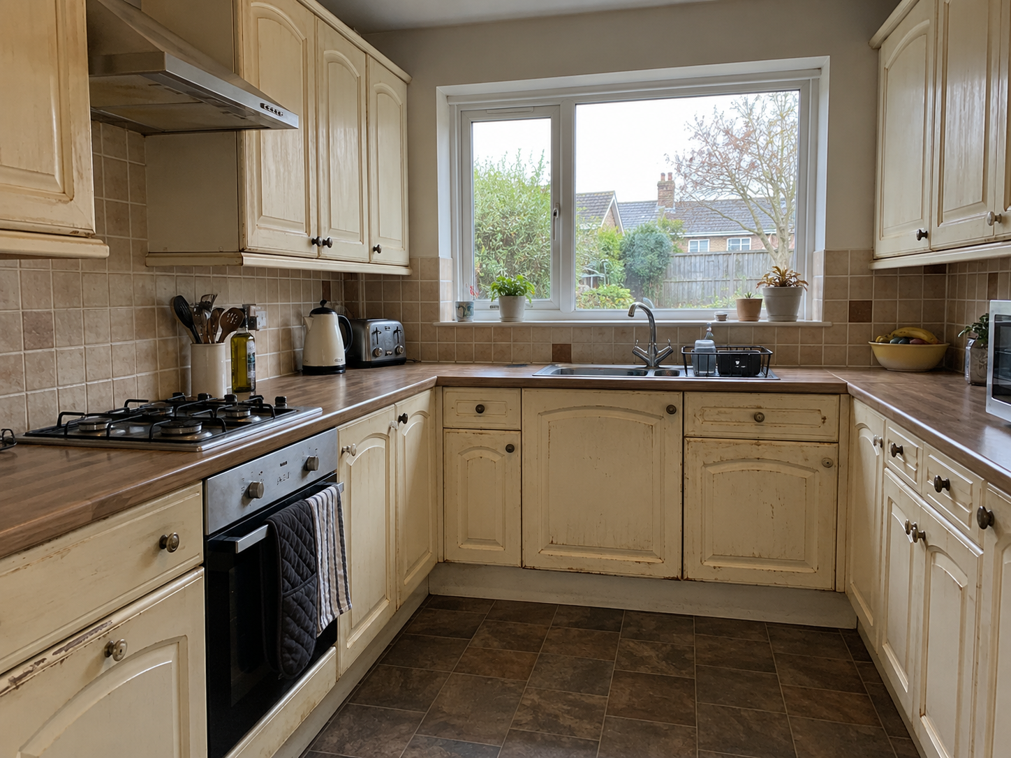 Kitchen cabinets before professional spray refinishing
