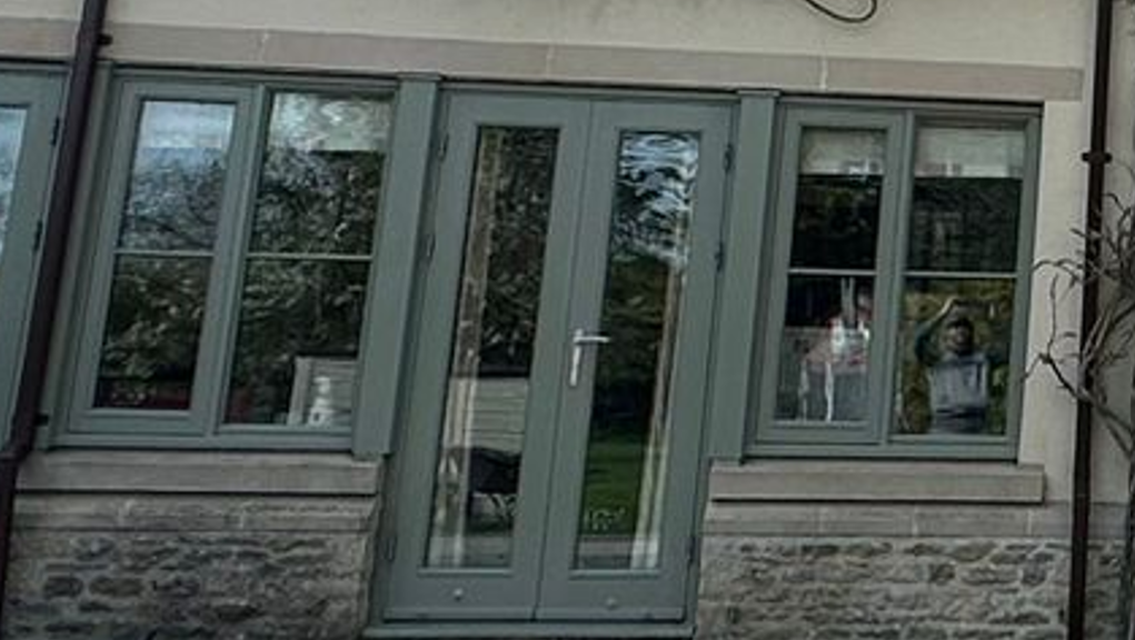 Close-up of restored sash windows and doors after refinishing